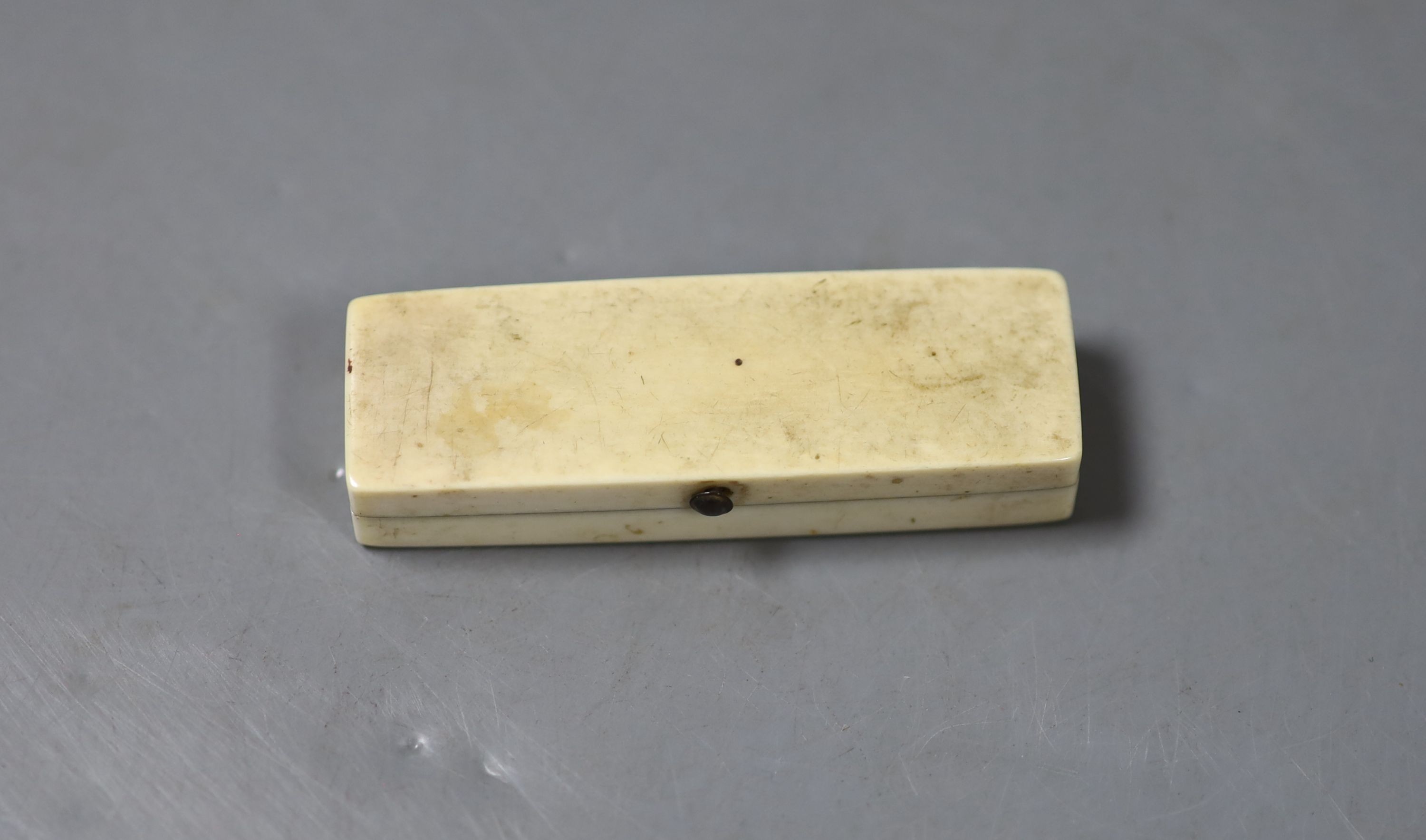 A George III ivory toothpick case, now containing a small thermometer